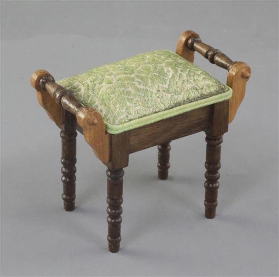 Denis Hillman. A Victorian style miniature piano stool, width 2in.